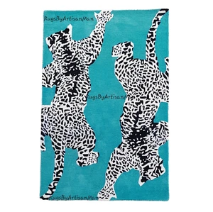 Climbing Jaguar Light Blue Animal Design Premium Quality Hand Tufted Woolen Rug. - Picture 1 of 5