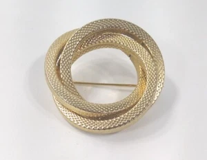 Broche prendedor Twisted Infinity Circles clásico dorado - Imagen 1 de 3