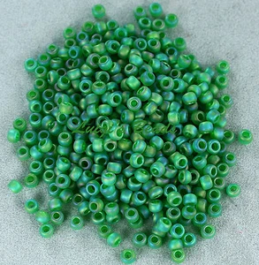 Cuentas redondas de semillas de vidrio TOHO 8/0 #167BF-trans-arco iris-hierba esmerilada verde 10 g - Imagen 1 de 2