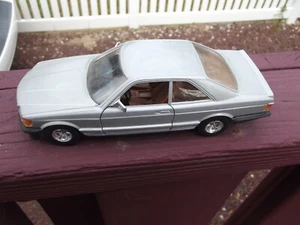 MERCEDES 500 SEC, MADE IN ITALY BY BURAGO, 1/26 SCALE, SILVER COLOR, DOORS OPEN - Picture 1 of 10