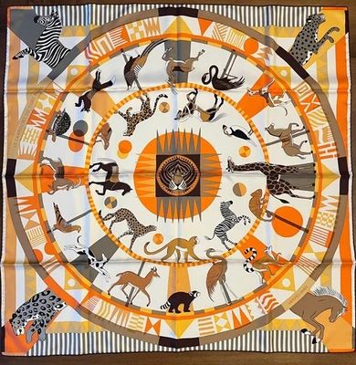 Bufanda Hermès 90 NUEVA CON ETIQUETAS - Le Carrousel du Tigre Royal - Sarga de seda naranja - Auténtica Foto 1 de 4