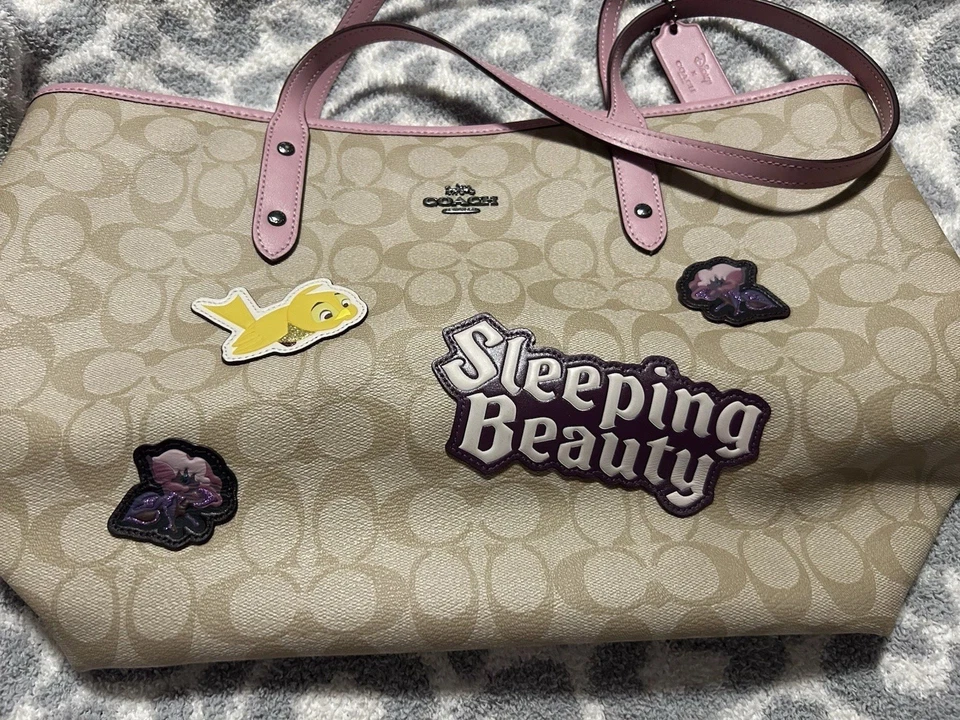 蔻驰睡美人单肩包钱包 — 第 1/4 张图片