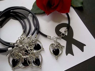 MELANOMA CANCER AWARENESS  'SUPPORT WITH LOVE' BRACELETS - 6 COUNT  - Image 1 of 2