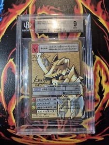 Digimon Digi-Battle Juego de cartas coleccionables Zubamon Re-136 Oro 20º Conjunto conmemorativo Holo BGS 9 COMO NUEVO - Imagen 1 de 2
