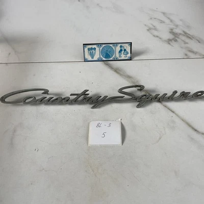 Ford Country Squire Wagon cuarto panel emblema 1966 - C6AB-71291A36-B escritura Foto 1 de 4