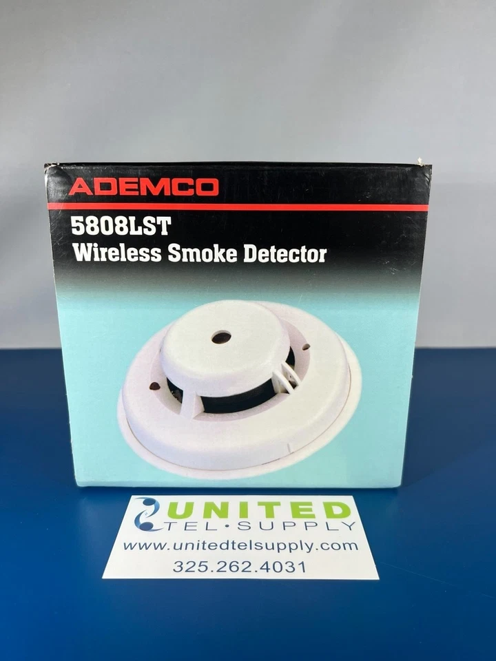 Беспроводной фотоэлектрический детектор дыма и тепла пожарная сигнализация ADEMCO 5808LST отличное состояние - Изображение 1 из 1
