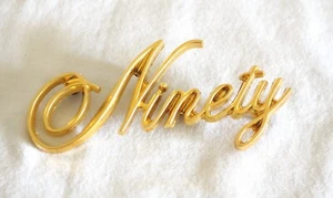 1971 - 1976 OLDSMOBILE 24K GOLD PLATED "NINETY" METAL EMBLEM - 9858552 - Picture 1 of 2