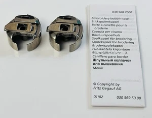 Bernina Embroidery Bobbin Cases 0305687000 Pair Genuine OEM w/Paperwork - Picture 1 of 8