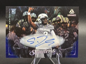 2025 Panini Luminance Shedeur Sanders Auto RC Blue Rookie #/50 Browns - Picture 1 of 2