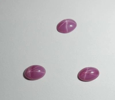 Opaque Star Ruby Oval 6x4 mm Cabochon 6 Rayed Lab-created Stone 3 piece Lot - Image 1 of 4