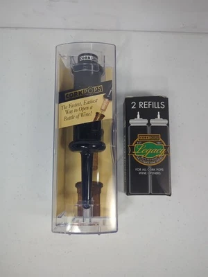 Abridor de botellas de vino de gas Cork Pops con 1 cartucho caja abierta y dos recargas nuevas Foto 1 de 3