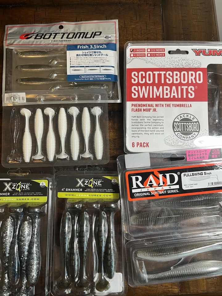 Lot of paddletail swimbaits: BottomUp, Yum, Raid, XZone Used Read Description - Image 1 of 4