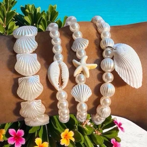 Juego de 4 brazaletes elásticos con cuentas de perlas sintéticas concha de playa bohemias - Imagen 1 de 5