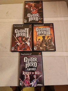 Lotto 4 giochi Guitar Hero PlayStation 2. Con 3 manuali - Foto 1 di 6