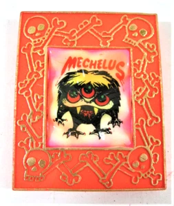 Vintage 1970's Mechelus Glow In Dark Framed Monster Charm Vend Toy Old Stock OB - Picture 1 of 1
