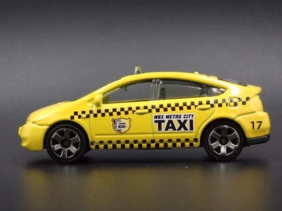 2003-2008 Toyota Prius Taxi Yellow 1/64 Scale Collectible Diorama Modellino - Immagine 1 di 4