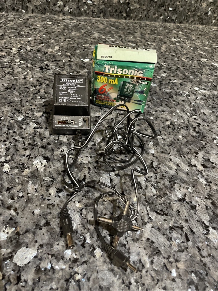 Trisonic TS-503B Universal 300ma AC/DC 6 Outputs Adaptor  3V 4.5V 6V 7.5V 9V 12V - Image 1 of 4