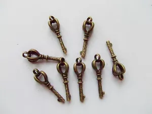8pz charms ciondolo CHIAVE colore bronzo 27x9mm - Foto 1 di 1