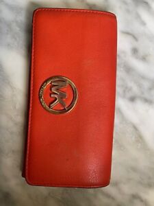 MICHAEL KORS, RED LEATHER WALLET ( has little wear and light ink spots)