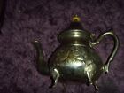 ornate tea pot with makers mark on the bottom see photos