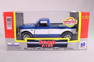 LE7340 NEW-RAY 1/32 Voiture Ford F-150 pick up bleu friction - Foto 1 di 5
