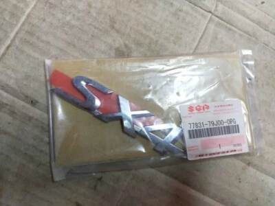 Parrilla delantera Suzuki Grand Vitara SX4 2006-2013 cromo emblema S 77811-65J00-0PG Foto 1 de 3