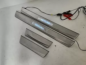 JDM NISSAN SKYLINE V35 4DOOR SEDAN LIGHT UP SCUFF KICK PLATES OEM RARE - Picture 1 of 11