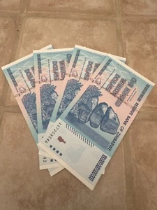 ๐ฅ LOT OF 4 ๐ฅ 100% AUTHENTIC ZIMBABWE 100 TRILLION DOLLAR CURRENCY, AA/2008 ๐ฅ - Picture 1 of 9