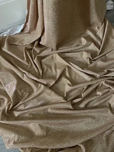 1 mtr two tone gold/pink sparkly moonlight,stretch dress fabric 58”wide (147cm) - Picture 1 of 10