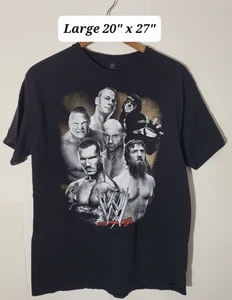 T-shirt WWE 2014 All Stars Large nera (Undertaker, John Cena, Rock Lesner) - Foto 1 di 4
