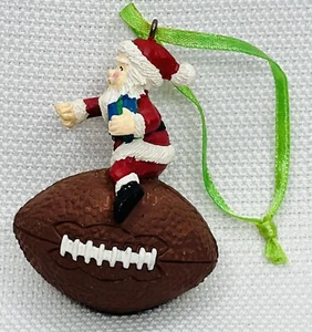 Santa On Football figural ceramic Christmas Ornament - Picture 1 of 5