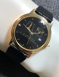 Vintage Tri-Star Columbia Motion Pictures Watch W/Date 35mm Gold Tone New Bat - Picture 1 of 22