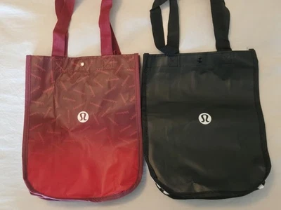 (2) LULULEMON SMALL TOTE REUSABLE BAGS.  RED AND BLACK. YOU GET BOTH BAGS.  - Image 1 of 4