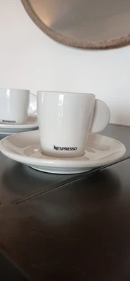 LOT DE 2 TASSES NESPRESSO EN PORCELAINE  - Photo 1/4