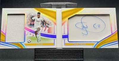 2023-24 Panini Immaculate Vini Jr. Silver Signature Moves Patch Auto Booklet /99 - Image 1 of 3