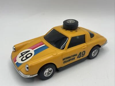 Radio de colección marca Electro AM X 10 K HZ Porsche amarilla rara difícil de encontrar #49 Foto 1 de 4