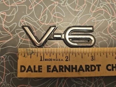 Pontiac Grand Am V6 V-6 1992-1998 guardabarros emblema lateral insignia logotipo OEM ORIGINAL 92  Foto 1 de 4