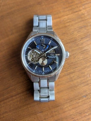 Reloj de pulsera automático JDM Orient Star WZ0191DK moderno esqueleto segundos pequeños azul Foto 1 de 4