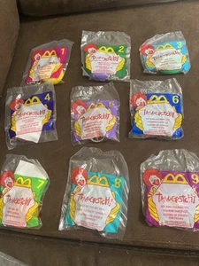 TAMAGOTCHI McDonald’s Happy Meal NIP Set Of 9 RARE EXCLUSIVE MAGENTA 1998 - Picture 1 of 2