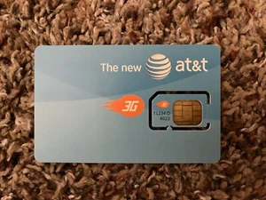 Vintage AT&T 3G SIM card on original punchcard - Zdjęcie 1 z 2