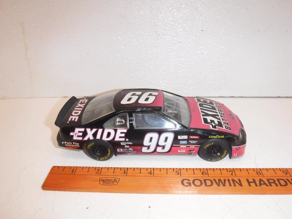 Coche diecast Jeff Burton Racing Champions Exide 1995 # 99 Thunderbird escala 1/18. Foto 1 de 4