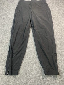 Pantalones de chándal Athleta para mujer talla 6 negros con bolsillos elásticos en la cintura y cremallera en las piernas - Imagen 1 de 20