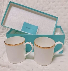 Tiffany & Co. Goldband Becher Tasse 2er Set Porzellan Tee Kaffee Tassen mit Box NEU - Bild 1 von 5
