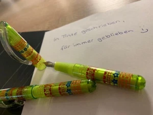 Minifüller in hellgrün mit Herzen, Blumen + verschiedenes - Leicht und handlich - Bild 1 von 2