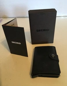 Sacrid Mini Portafoglio Vintage Nero con Nucleo in Alluminio RFID NUOVO CON SCATOLA BF - Foto 1 di 8