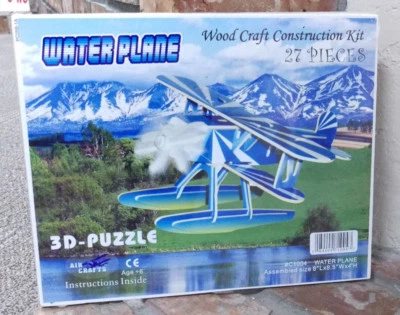 Wood 3D Float Plane Puzzle 27 pieces 8 x 8.5 x 4 inches, pieces in color - Image 1 of 4