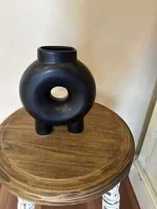 Black Ceramic Donut Shaped Vase 8 Inches Height X 6 1/2 Inches Width - Picture 1 of 3