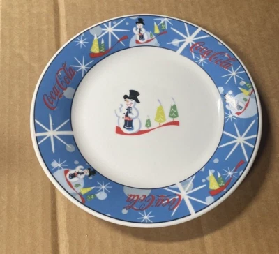 Muñeco de nieve riendo de gres Coca Cola de colección 7" plato del desierto copos de nieve azules Foto 1 de 4