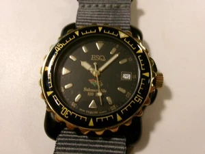 ESQ submersible quartz watch. Rotating bezel. Black and gold tone. Good cond. - Picture 1 of 15