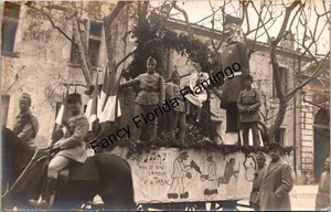 Vintage French RPPC Soldiers Carnival Parade “Vive le Vin, l'Amour et le Tabac" - Picture 1 of 2